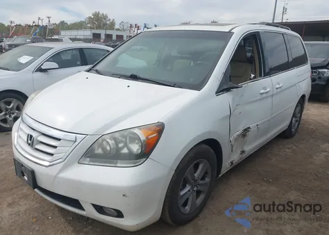 2010 Honda Odyssey Touring из США, поврежденный, VIN 5FNRL3H9XAB074564